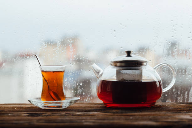 istock Hot tea in the pot near the window 1131387432