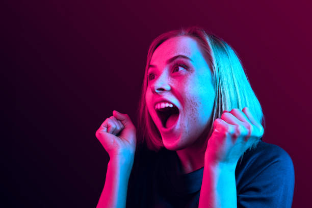 istock Winning success woman happy ecstatic celebrating being a winner. Dynamic energetic image of female model 1131388999
