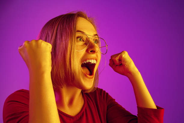 istock Winning success woman happy ecstatic celebrating being a winner. Dynamic energetic image of female model 1131389039