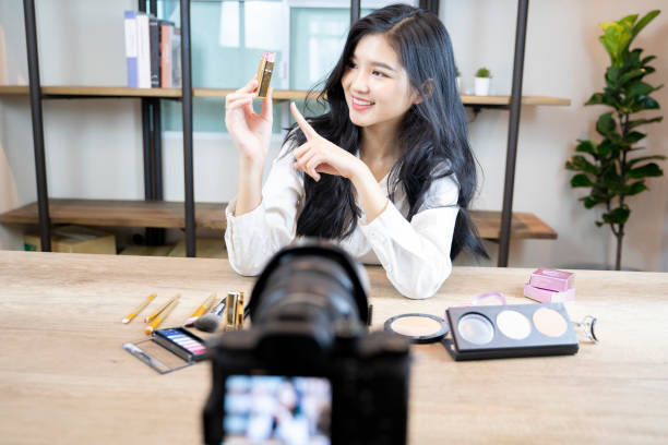 istock Asian young female blogger on camera screen - Image 1131389522