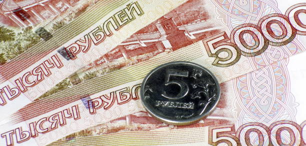 istock stack of money bond and coin 1131389583