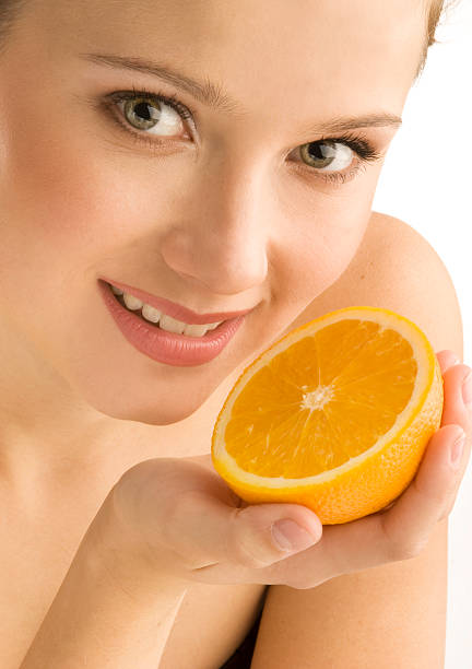 istock Girl with orange. 113138983