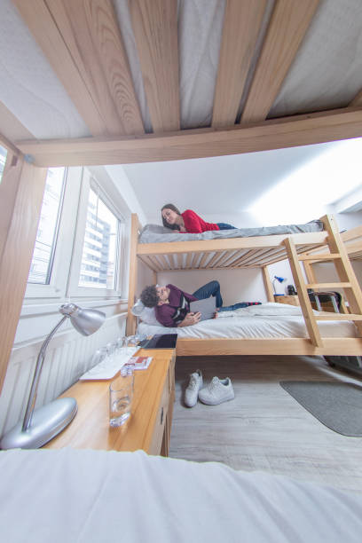 istock Friends having fun in the hostel 1131390024
