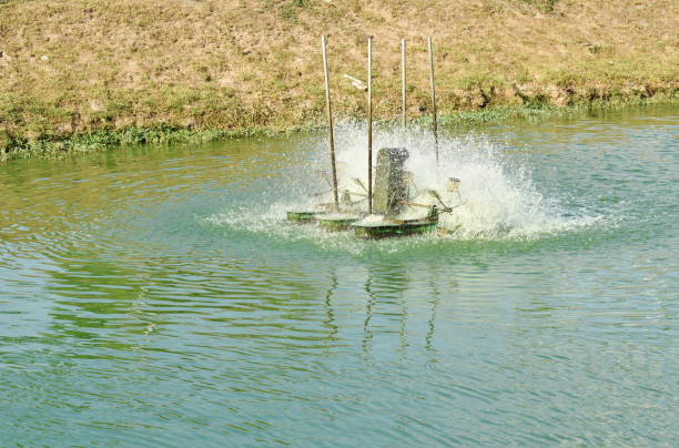 istock hydraulic turbine spinning for waste water treatment 1131390979