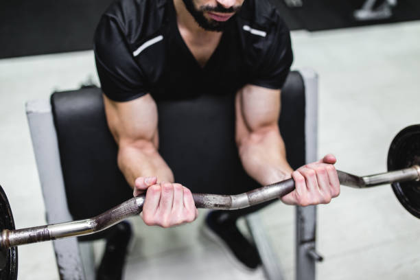 istock Strong man`s hands in the gym 1131392400