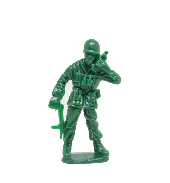 istock miniature toy soldier on white background, close-up 1131393732