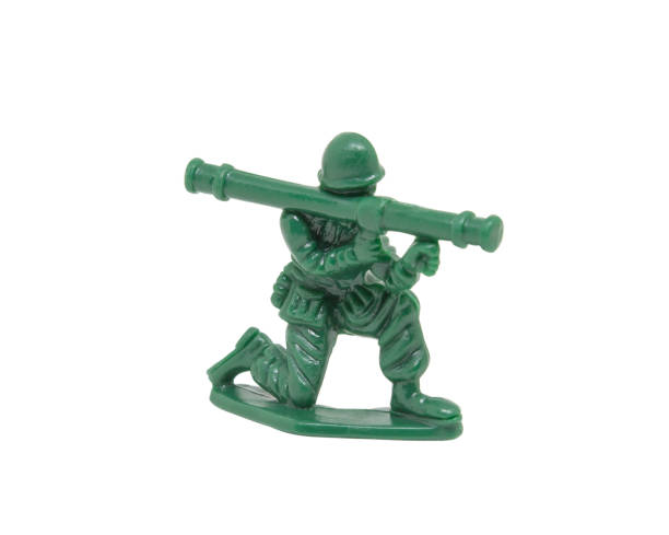 istock miniature toy soldier on white background, close-up 1131393734