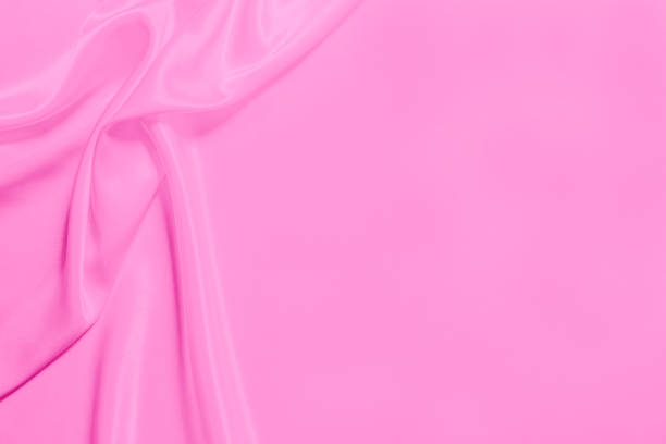 istock Smooth elegant pink silk or satin texture can use as background. 1131394336