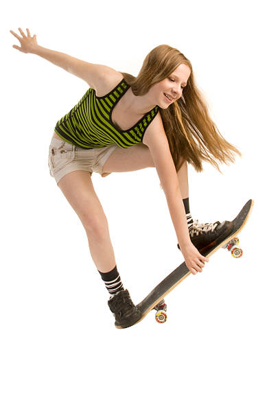 saltando ragazza-skateboard. - extreme skateboarding action balance motion foto e immagini stock