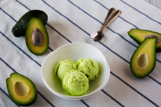 istock Homemade avocado ice-cream in a bowl, low angle view. Close-up. 1131397142