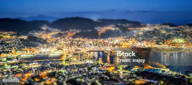 Business Concept Tilt Shift Effect Modern Cityscape Of Nagasaki Dusk From Mount Inasa The New Top 3 Nightview Of The World Aerial View Copy Space Stock Photo - Download Image Now