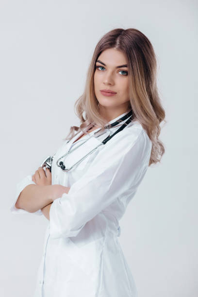 istock doctor woman in white coat with stethoscope 1131403911