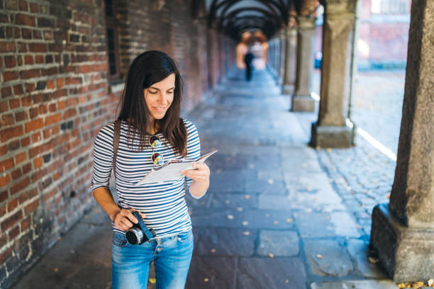 istock Woman at Lubeck town hall 1131409606