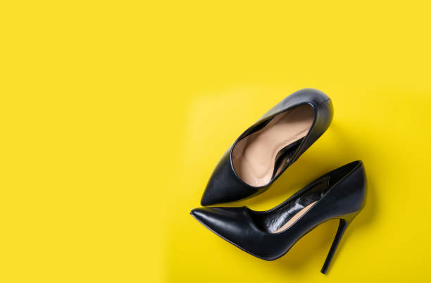 istock Black pair of beautiful shoes and space for text 1131409611