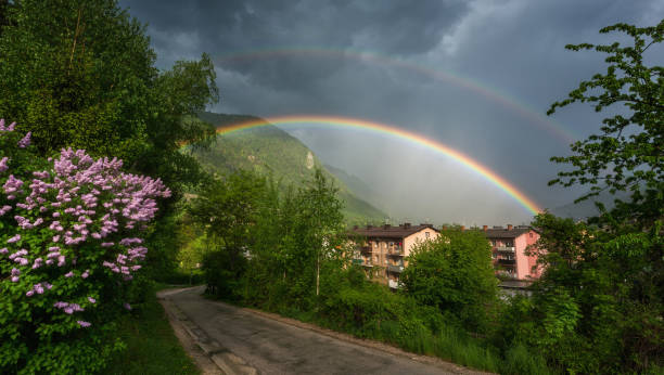 Rainbow over the town Rainbow over the town and buildings municipality of jesenice photos stock pictures, royalty-free photos & images