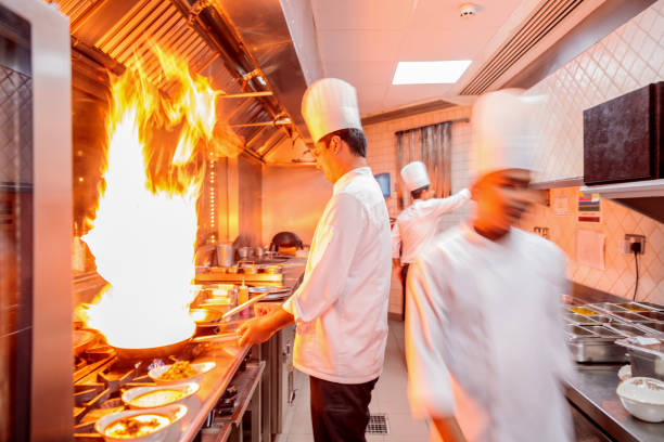 istock Chef giving a Final Touch to the Recipe with a Flambe 1131411933