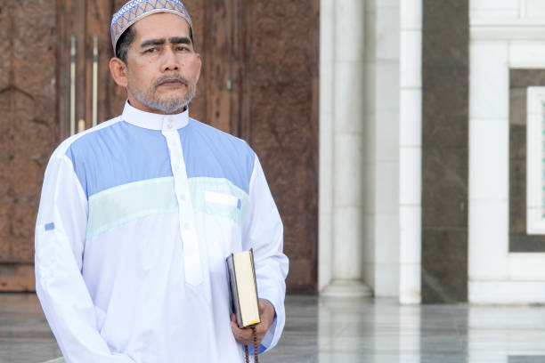 istock Portrait Of Man Standing At Mosque 1131412081