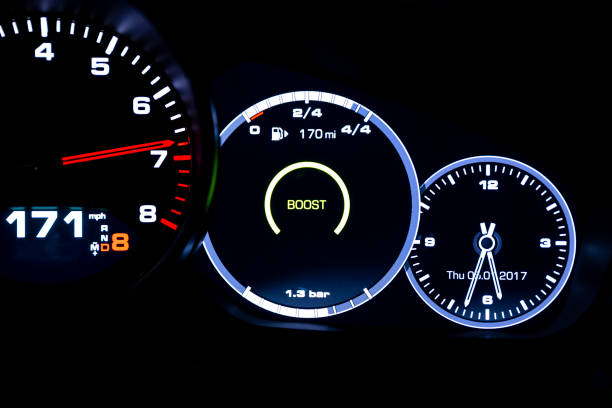 istock Modern light car mileage on black background 1131418121