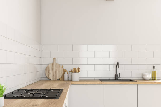 istock White kitchen counter with sink and oven 1131420260