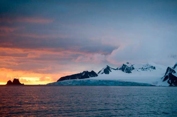 istock Iceberg in the sunset on beautiful sea 1131420404