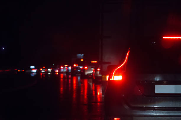 istock Traffic on a wet wet road 1131422077