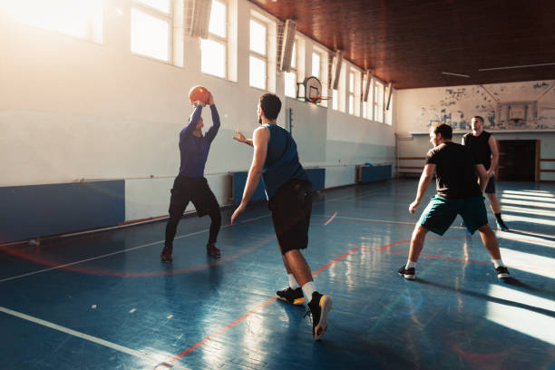 istock basketball players playing basketball 1131422091