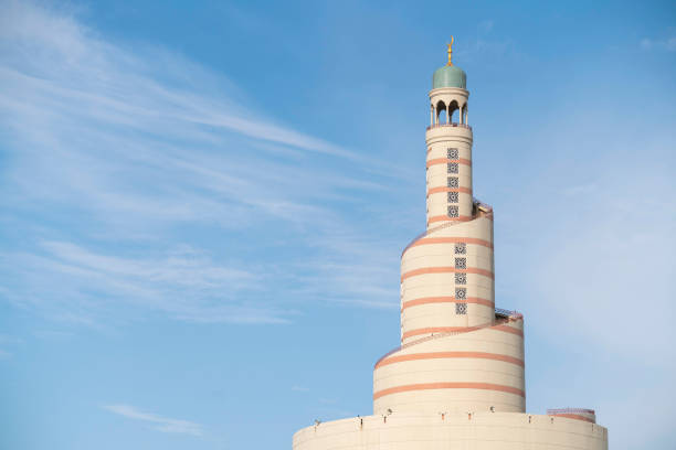 istock Traditional Arabic Architecture Fanar Tower of Doha with Sky Background 1131422801