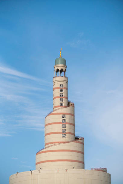istock Traditional Arabic Architecture Fanar Tower of Doha with Sky Background 1131422806