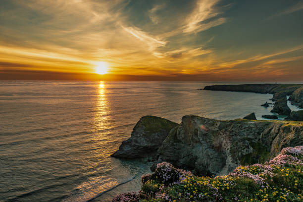 istock Beautiful dusk sunset of Bedruthan Steps rock stacks in Cornwall, UK 1131424795