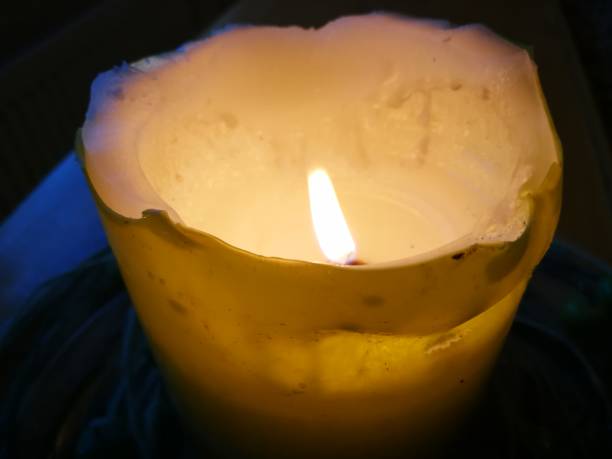 istock Close up of burning candle 1131426219