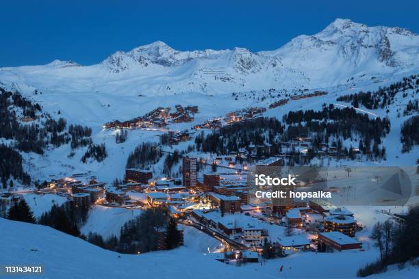 View Of High Altitude Ski Resorts In French Savoy Alps In Twilight Plagne Centre Plagne Soleil And Plagne Village Stock Photo - Download Image Now