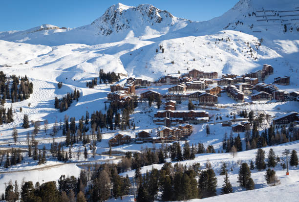 Scenic view of a high altitude ski resort Belle Plagne in French Savoy Alps on a beautiful sunny day. Scenic view of a high altitude ski resort Belle Plagne in French Savoy Alps on a beautiful sunny day. La Plagne is a part of the world's second largest linked ski area called Paradiski la plagne photos stock pictures, royalty-free photos & images