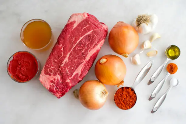 Beef, vegetables, and spices used to make Hungarian beef goulash