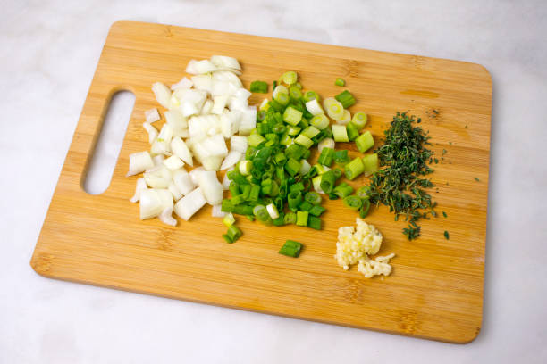 istock Chopped Onions, Scallions, Thyme, and Ginger 1131436748