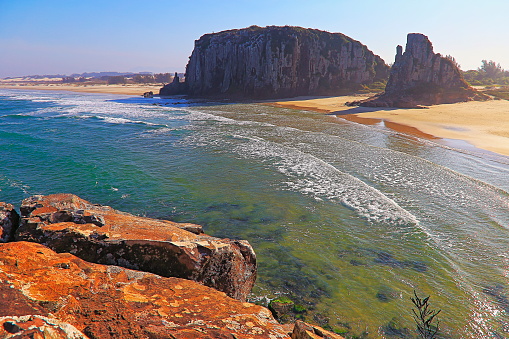 Above Sandy beach in Torres city with cliffs rock formations – Rio Grande do Sul, Southern Brazil