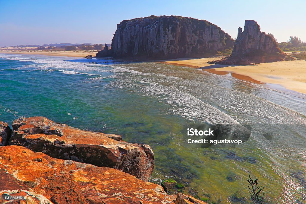Above Sandy beach in Torres city with cliffs rock formations – Rio Grande do Sul Above Sandy beach in Torres city with cliffs rock formations – Rio Grande do Sul, Southern Brazil Tower Stock Photo