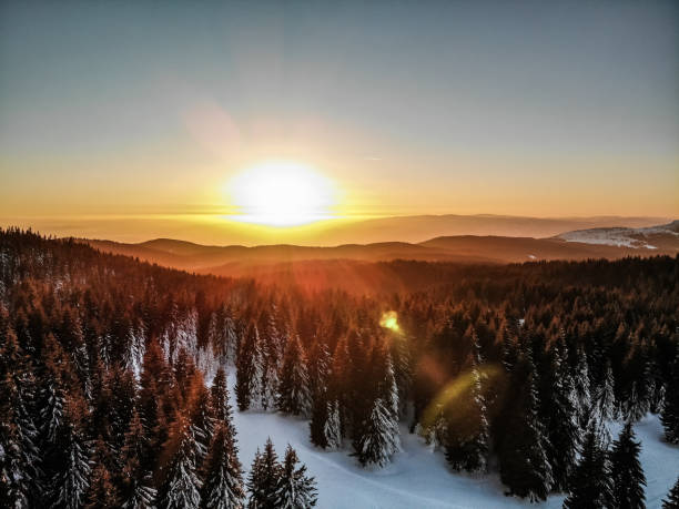 Beautiful winter sunrise in the mountains stock photo