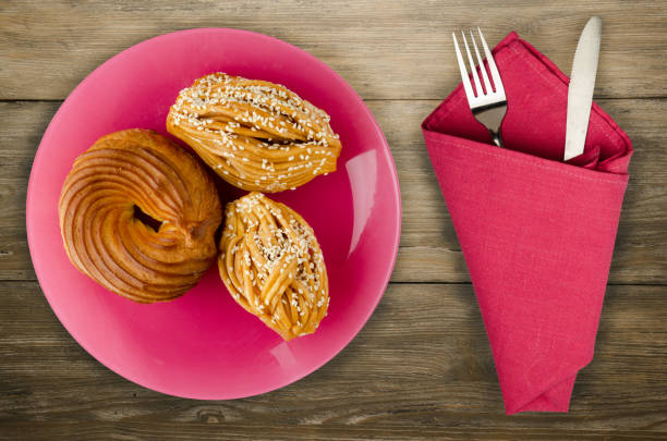 istock cakes on a wooden background. 1131447267