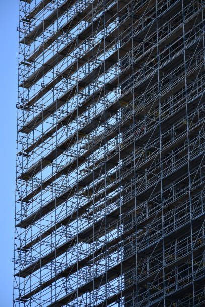 istock Scaffolding with Blue Sky and Building 1131447282