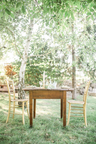 istock Wedding decor for elegant table setup in gold and blue pastels for a tuscany style wedding, eucalyptus greenery and geometric decoration. vertical Imagei 1131449387