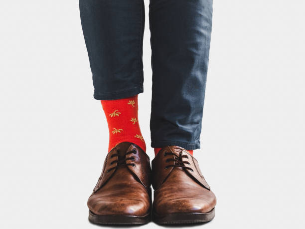 istock Office Manager in stylish shoes and bright socks 1131453158