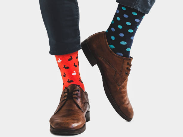 istock Office Manager in stylish shoes and bright socks 1131453241