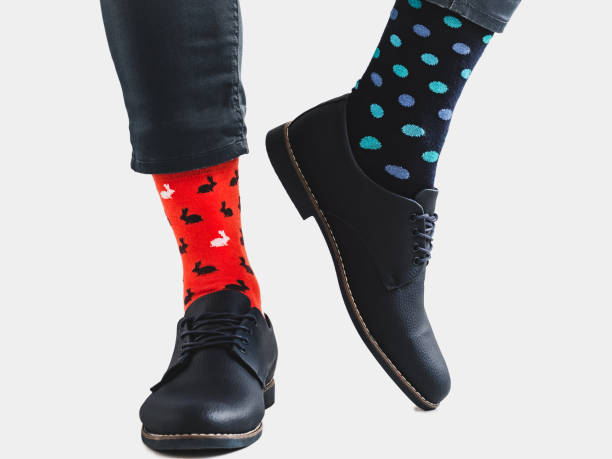istock Office Manager in stylish shoes and bright socks 1131453364