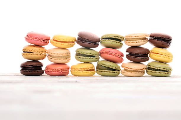 istock Sweet and colourful french macaroons or macaron on white background 1131453614