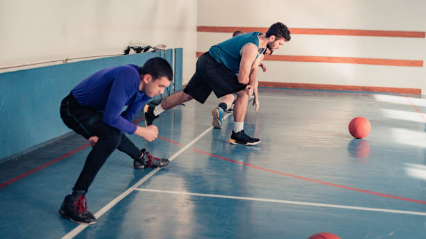 istock basketball players playing basketball 1131457985