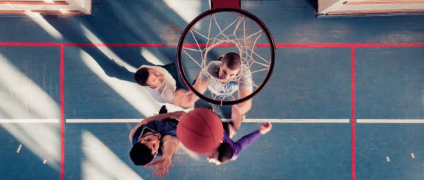 istock basketball players playing basketball 1131457997