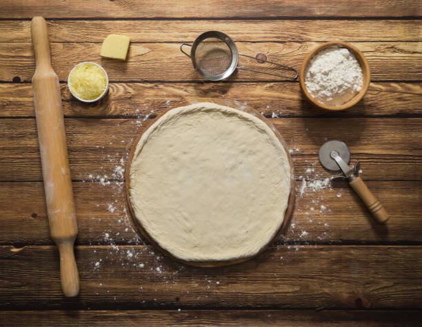 istock Cooking pizza. The shaping of dough for pizza. 1131460328
