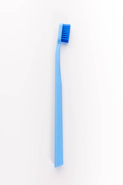 New tooth brush isolated on white background. Dental care stock photo