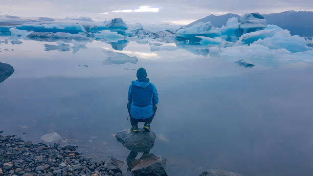 istock Iceland - Man at the Ice lagoon 1131462547