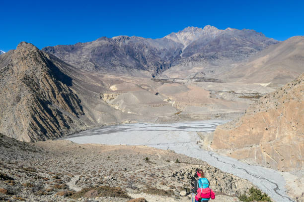 istock Nepal - Trekking girl in Mustang Valley 1131463490